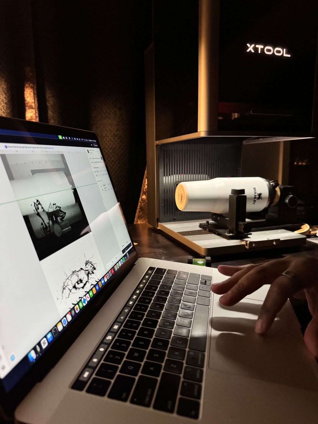 Design work in progress — laptop and xTool laser machine in the Formed and Finish studio