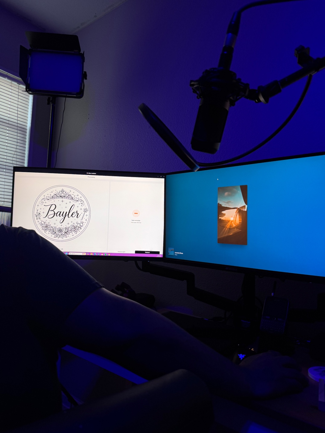 Custom lettering design in progress on dual monitor setup