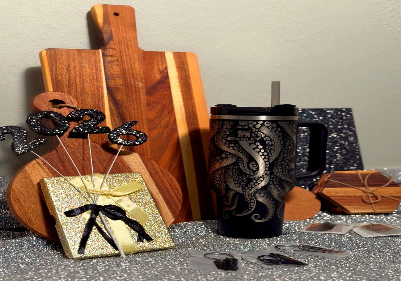 Custom laser engraved graduation gifts — Stanley tumbler, charcuterie boards, keychains and more